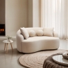 LAZY Svängd, tvåsitsig designersoffa i beige teddybouclé-tyg Kampanj
