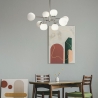 Modern pendellampa 8 sfärer vitt glas vardagsrum Erich Maytoni Rea