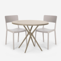 Set 2 stolar polypropen runt beige bord 80cm design Aminos Erbjudande