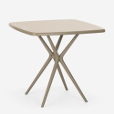 Set 2 stolar kvadratiskt beige bord 70x70cm polypropen utomhus Clue Pris